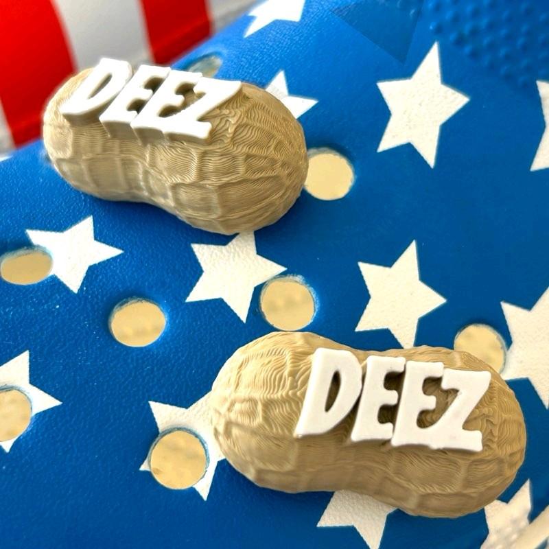 DEEZ NUTS funny clog charms 2 pack, Made in America,  universal fit for most size clog style shoes, unique patented design bold DEEZ lettering on a hard lightweight plastic peanut, simple push into clog style shoes. Footwear